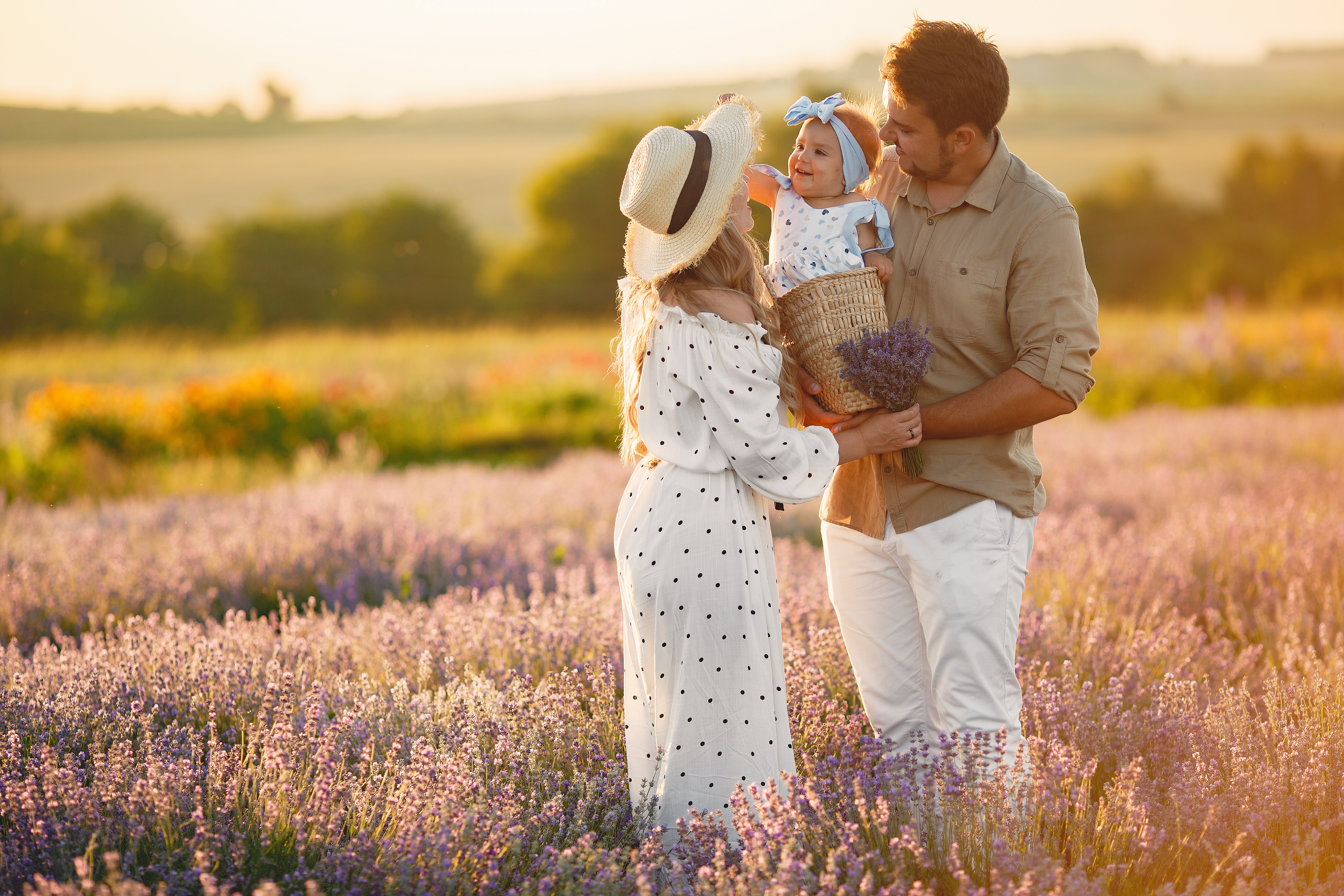 family-with-little-daughter-lavender-field-beautiful-woman-cute-baby-playing-meadow-field-family-holiday-summer-day.jpg